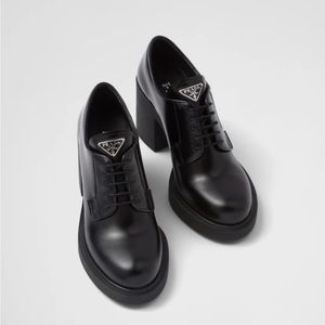 Prada Heeled brushed leather lace-ups